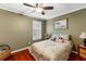 Bedroom with a ceiling fan, and hardwood floors, and a sunny window at 159 Bridgecreek Dr, Goose Creek, SC 29445