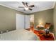 Bedroom featuring hardwood floors, ceiling fan, closet, and rocking chair at 159 Bridgecreek Dr, Goose Creek, SC 29445