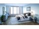 Cozy bedroom featuring a large window, plush bedding, and stylish decor at 1680 Siloh Dr # 469, Mount Pleasant, SC 29466
