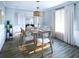 Beautifully staged dining room featuring a wood table, seating for six, and modern decor at 1680 Siloh Dr # 469, Mount Pleasant, SC 29466