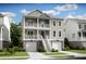Charming two-story home with double porches, a two-car garage, and classic coastal curb appeal at 1680 Siloh Dr # 469, Mount Pleasant, SC 29466