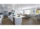 Bright, open kitchen featuring white cabinets, stainless appliances, and a large island with seating at 1680 Siloh Dr # 469, Mount Pleasant, SC 29466