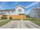 View of the home's backyard and parking area, showcasing the outdoor space at 1717 Brittlebush Ln, Johns Island, SC 29455