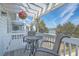 Relaxing balcony space with seating and a hanging flower basket offering scenic views at 1717 Brittlebush Ln, Johns Island, SC 29455