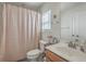 Well-maintained bathroom with a shower/tub, vanity, and a decorative shower curtain at 1717 Brittlebush Ln, Johns Island, SC 29455