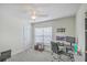 Functional bedroom with a ceiling fan, bright natural light, and ample workspace at 1717 Brittlebush Ln, Johns Island, SC 29455