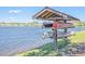 Sheltered canoe rack alongside the lake provides convenient community boating access at 1717 Brittlebush Ln, Johns Island, SC 29455
