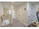 Upstairs hallway featuring carpeted floors, multiple storage closets and neutral paint at 1717 Brittlebush Ln, Johns Island, SC 29455