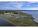 Breathtaking aerial view features the serene water views, marshland, and a private dock at 185 Wappoo Rd, Charleston, SC 29407
