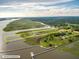Aerial view showcases the approximate property boundaries along the tranquil waterway and adjacent marshland at 185 Wappoo Rd, Charleston, SC 29407