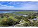 Breathtaking aerial view of property with yellow boundaries on a scenic waterfront location at 185 Wappoo Rd, Charleston, SC 29407