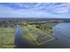 Stunning aerial view showcasing property boundaries along a picturesque waterfront setting at 185 Wappoo Rd, Charleston, SC 29407