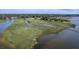 Stunning aerial view showcases the marsh landscape and waterfront access of this amazing property at 185 Wappoo Rd, Charleston, SC 29407