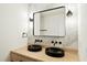 Contemporary bathroom design with dual sinks, a stylish mirror, and modern fixtures at 201 Hayden St St, Walterboro, SC 29488