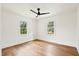 Inviting bedroom featuring wood floors, natural lighting, and modern ceiling fan at 201 Hayden St St, Walterboro, SC 29488