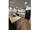 Updated kitchen features stainless steel appliances, butcher block countertop, and modern fixtures at 201 Hayden St St, Walterboro, SC 29488