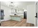 Charming kitchen featuring an island, stainless steel appliances, and modern light fixtures at 201 Hayden St St, Walterboro, SC 29488