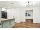 Open kitchen layout with modern appliances, island sink, and light fixtures at 201 Hayden St St, Walterboro, SC 29488