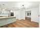Updated kitchen view showcasing the island, modern lighting, and open floorplan at 201 Hayden St St, Walterboro, SC 29488