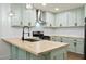 Modern kitchen with updated cabinets, butcher block countertops, and stainless steel appliances at 201 Hayden St St, Walterboro, SC 29488