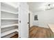 Large pantry area with ample shelving, located near the kitchen and living space at 201 Hayden St St, Walterboro, SC 29488