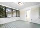 Inviting screened porch features painted wood floors and a view of the backyard at 201 Hayden St St, Walterboro, SC 29488