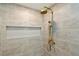 Tiled shower with a rainfall showerhead and built-in niche at 201 Hayden St St, Walterboro, SC 29488