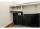 Picture of a storage room with black and white walls and ceiling shelves at 201 Hayden St St, Walterboro, SC 29488