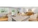 Open concept living space featuring a living room, dining room, and kitchen area at 2234 Macallan Blvd, Ravenel, SC 29470