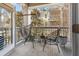 Inviting balcony with a hanging chair, stylish seating, and a decorative rug for relaxing outdoors at 2244 Ashley Crossing Dr # 426, Charleston, SC 29414