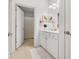 Bright bathroom featuring a white vanity, an open door to the shower, and neutral colors at 2244 Ashley Crossing Dr # 426, Charleston, SC 29414