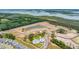 The aerial view shows a community with a pool, clubhouse, and undeveloped plots of land at 2280 Minfarm Way # 529, Mount Pleasant, SC 29466