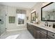 Elegant bathroom with double vanity, marble floors, and a shower, providing a spa-like experience at 2280 Minfarm Way # 529, Mount Pleasant, SC 29466