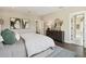 Bright bedroom featuring a modern dresser, hardwood floors, and neutral decor, offering a serene retreat at 2280 Minfarm Way # 529, Mount Pleasant, SC 29466