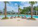 Resort-style pool with lounge chairs, manicured landscaping, and views of neighborhood homes at 2280 Minfarm Way # 529, Mount Pleasant, SC 29466