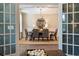 Spacious dining room with modern chandelier, view of an additional dining space, and neutral decor at 2280 Minfarm Way # 529, Mount Pleasant, SC 29466