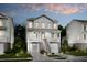 Charming two-story home featuring double garages, covered porch, and manicured landscaping at 2280 Minfarm Way # 529, Mount Pleasant, SC 29466