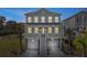 Charming two-story home with a double garage, a covered porch, and a bright green front door at 2280 Minfarm Way # 529, Mount Pleasant, SC 29466