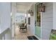 Inviting front porch with rocking chairs and a view of the neighborhood, perfect for relaxing at 2280 Minfarm Way # 529, Mount Pleasant, SC 29466
