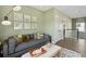 Comfortable living room with stylish decor, gray sofa, and soft, natural lighting at 2280 Minfarm Way # 529, Mount Pleasant, SC 29466