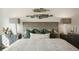 Beautiful main bedroom with stylish decor, gray headboard, and matching nightstands for a relaxing ambiance at 2280 Minfarm Way # 529, Mount Pleasant, SC 29466