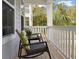 Cozy porch with rocking chairs, providing a relaxing outdoor space to enjoy the peaceful neighborhood views at 2280 Minfarm Way # 529, Mount Pleasant, SC 29466