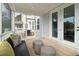 The porch features a cozy seating area and an inviting atmosphere at 2280 Minfarm Way # 529, Mount Pleasant, SC 29466