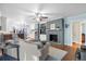 Comfortable living room area showcasing a grey brick fireplace and an open flow to the modern kitchen at 257 Druid Rd, Charleston, SC 29407