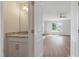 Bright bathroom with white cabinets and marble countertop at 2838 Otranto Rd, North Charleston, SC 29406