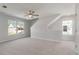 Bright bedroom with large windows, neutral carpet, and a ceiling fan offering lots of natural light at 2838 Otranto Rd, North Charleston, SC 29406