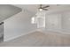 This spacious bedroom features neutral carpeting, ample natural light, and a ceiling fan for added comfort at 2838 Otranto Rd, North Charleston, SC 29406