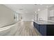 Bright, open floor plan with kitchen island featuring granite countertops at 2838 Otranto Rd, North Charleston, SC 29406