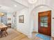 View of entryway showing arched doorway and decor at 285 Grove St, Charleston, SC 29403