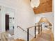 Hallway with high ceilings and a view of a cozy seating area by a bedroom at 285 Grove St, Charleston, SC 29403